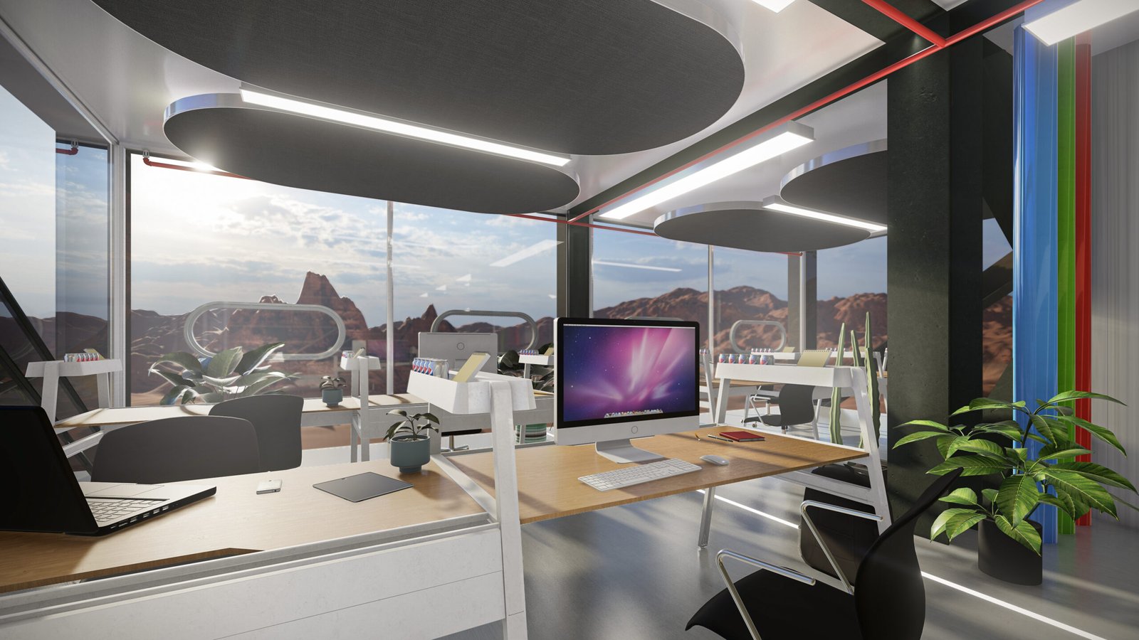 Modern office interior featuring modular workstations, large windows with mountain views, and greenery, reflecting ARC Development's innovative approach to adaptable living environments.